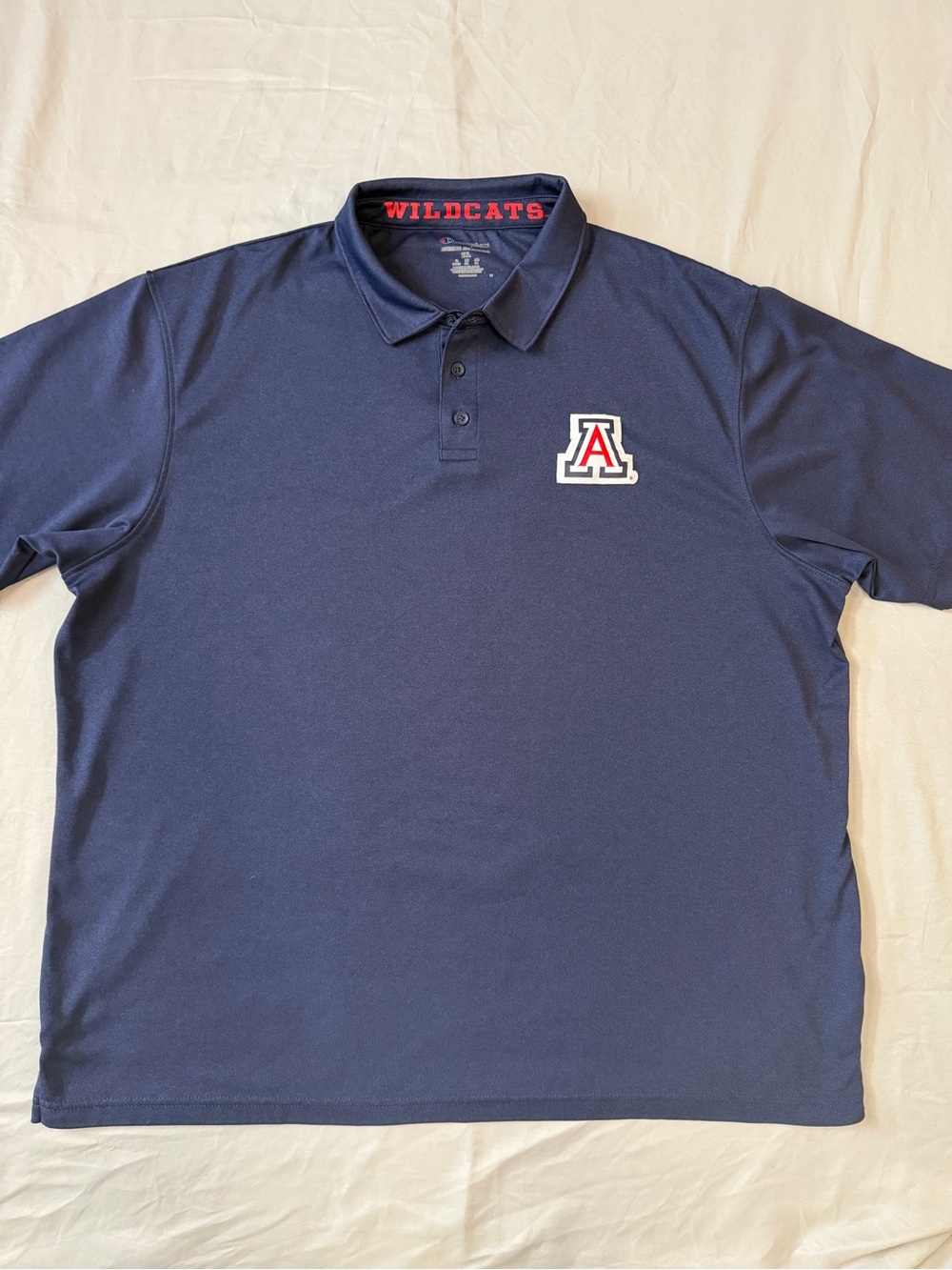Champion Navy Polo with Red & White Logo